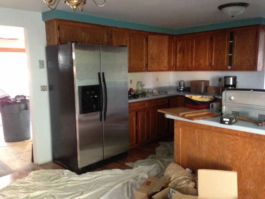 fitting the appliances into the kitchen